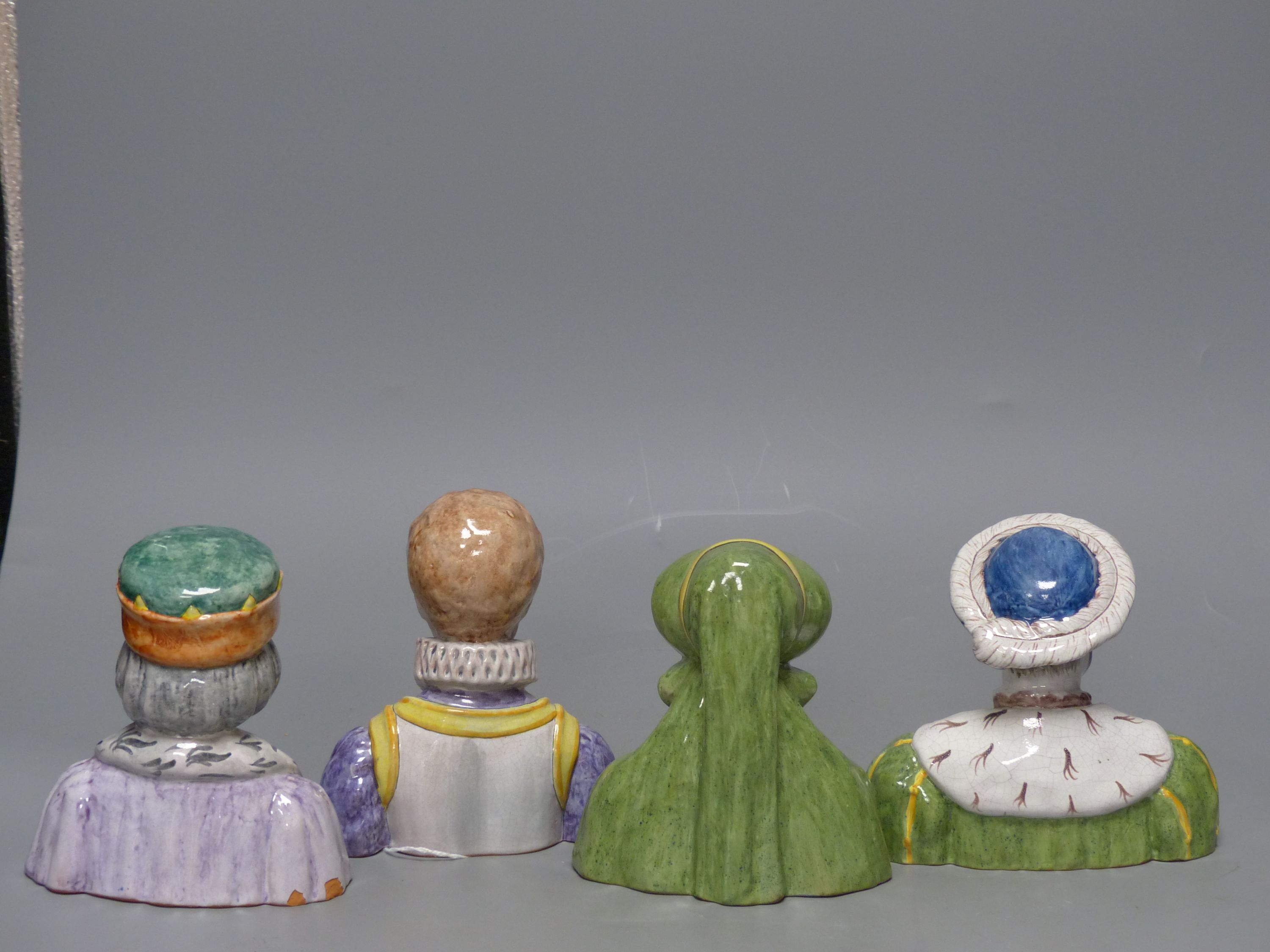 A French tin-glazed faience small bust of Catherine de Medici, another of Francois I and two others, tallest 15cm (4)
